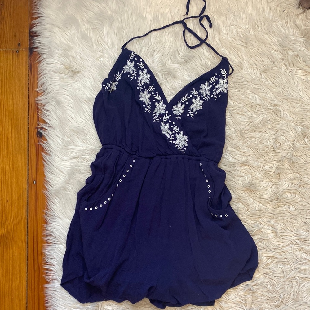 Navy and white floral embroidered  romper with halter neck and pockets